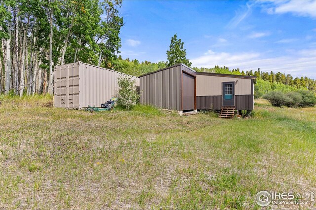 view of outbuilding with an outbuilding