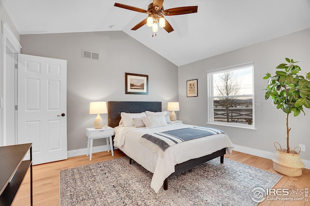 bedroom featuring wood-type flooring, ceiling fan, and lofted ceiling