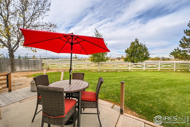 view of patio with a rural view