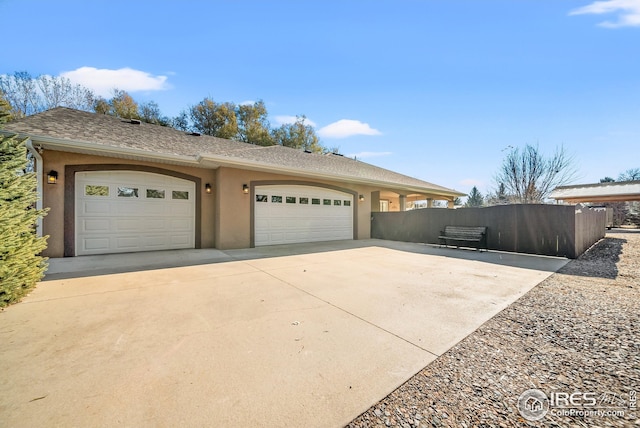 view of side of home with a garage