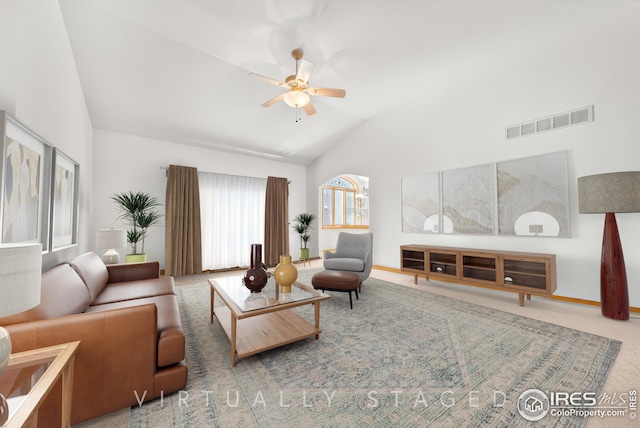 living room with lofted ceiling and ceiling fan