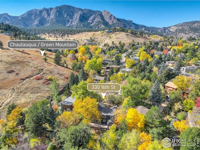 drone / aerial view featuring a mountain view