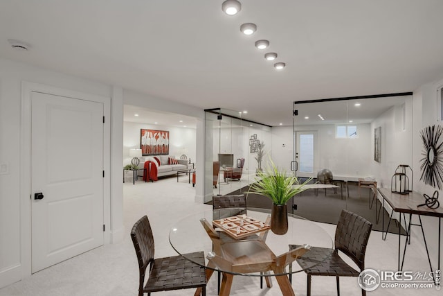 view of carpeted dining space