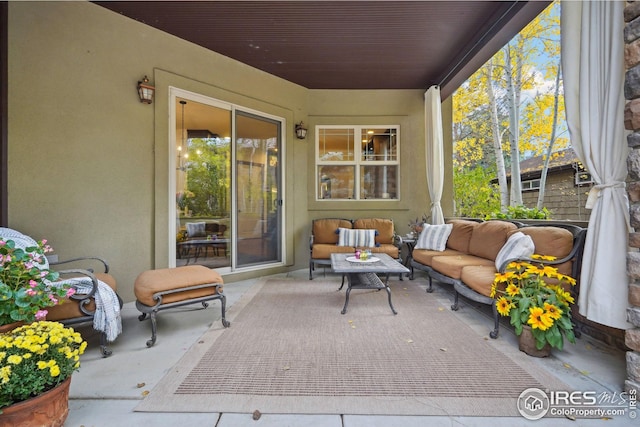 sunroom / solarium featuring plenty of natural light