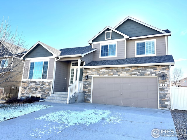 craftsman-style house featuring a garage