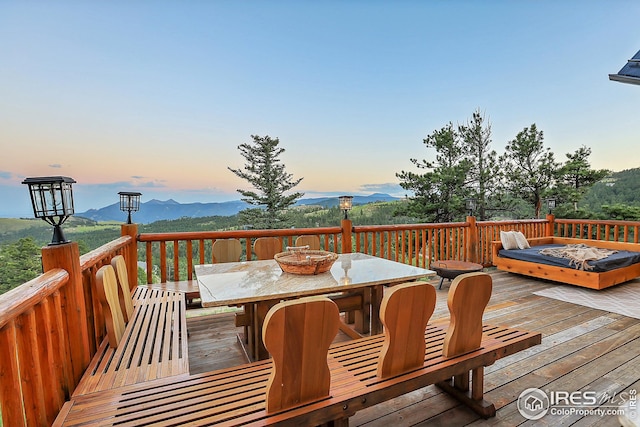 deck with outdoor dining space