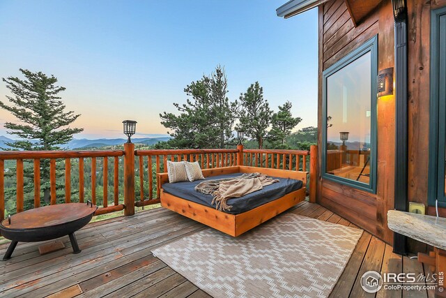 view of deck at dusk