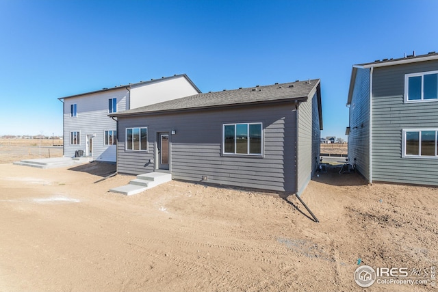 back of property featuring a patio