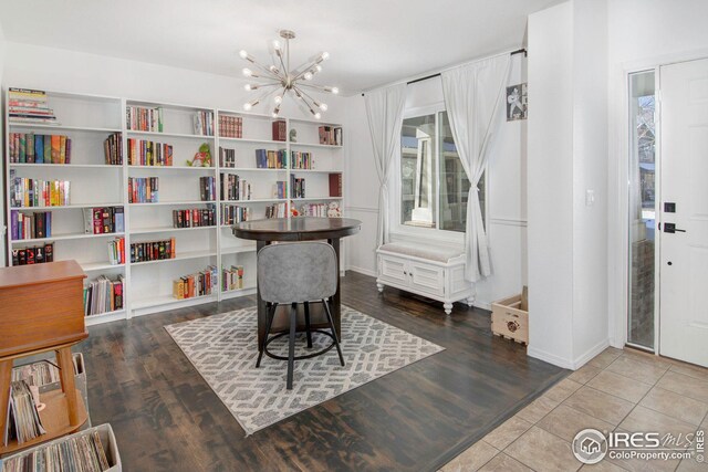 office space with an inviting chandelier