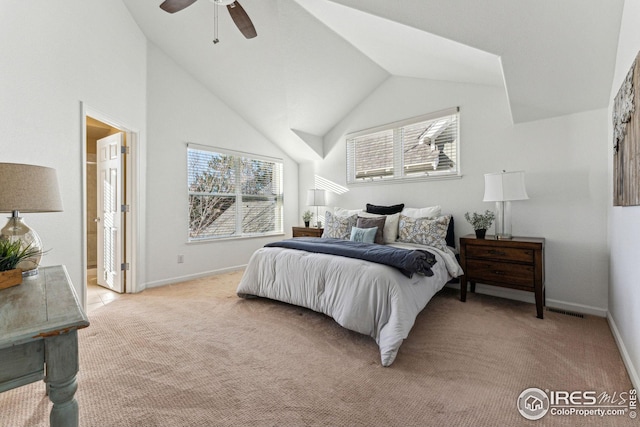 bedroom with baseboards, multiple windows, visible vents, and light colored carpet