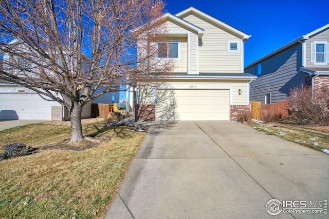 front facade with a garage and a front yard