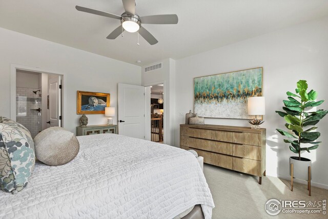 bedroom featuring ceiling fan and light colored carpet