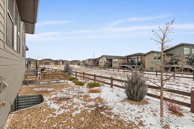 view of yard covered in snow