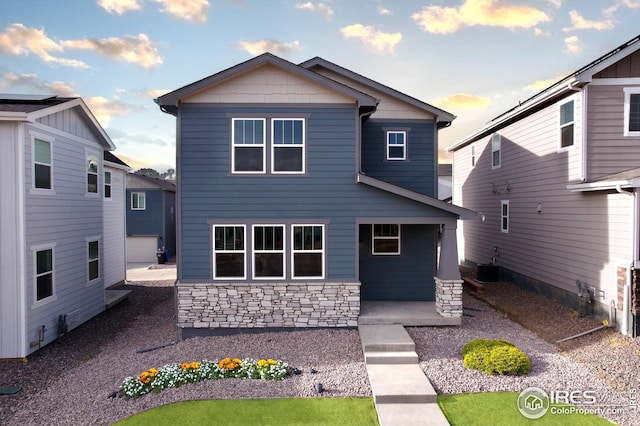 view of front of home with central air condition unit