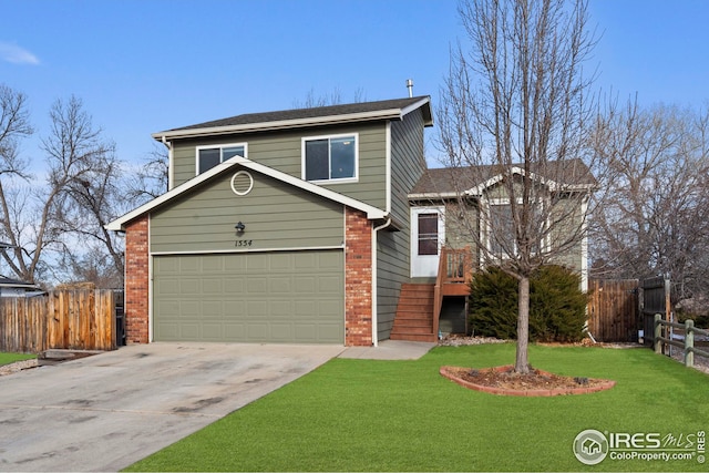 view of front property with a front yard and a garage