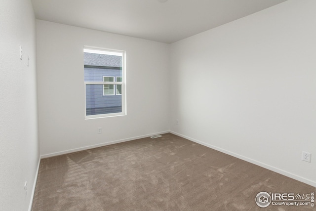 unfurnished room with carpet