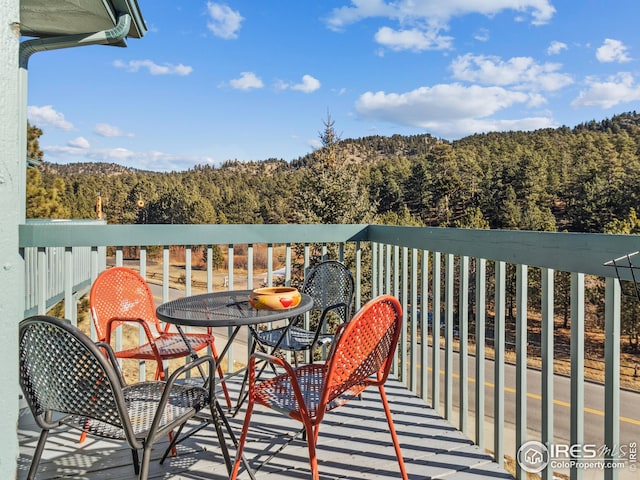 balcony with a forest view