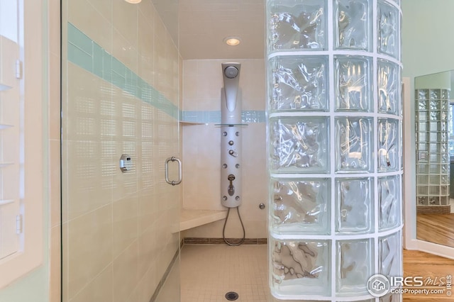 bathroom with an enclosed shower