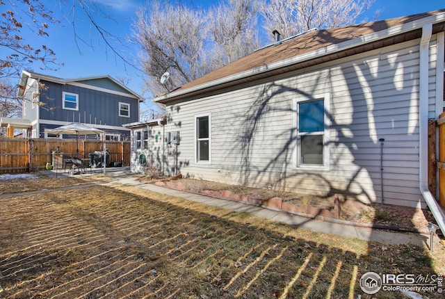 rear view of property with a patio