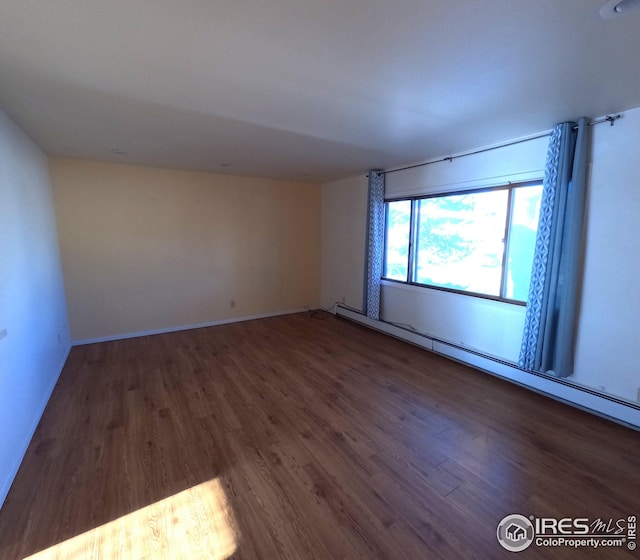 empty room featuring dark hardwood / wood-style floors