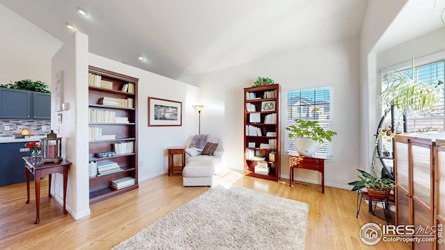 sitting room featuring light hardwood / wood-style floors