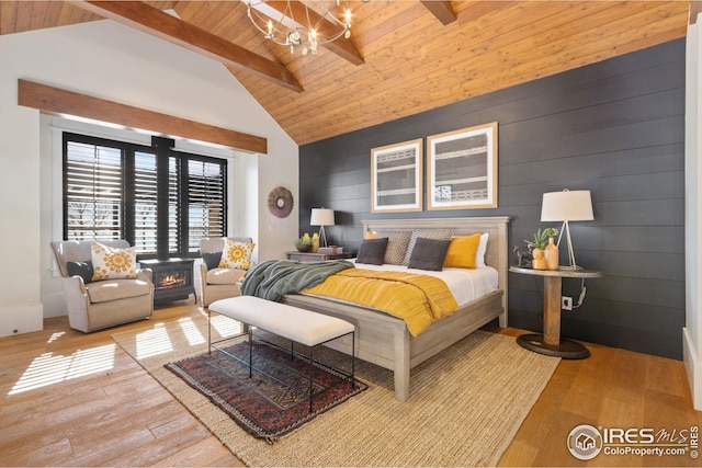 bedroom with high vaulted ceiling, wood-type flooring, a chandelier, wooden ceiling, and beamed ceiling