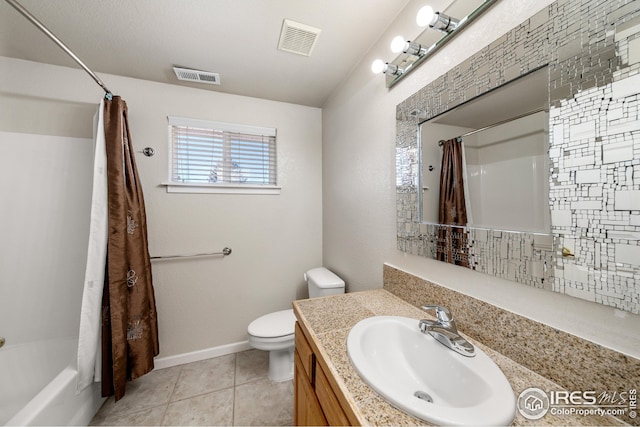 full bathroom with toilet, vanity, tile patterned flooring, and shower / bathtub combination with curtain