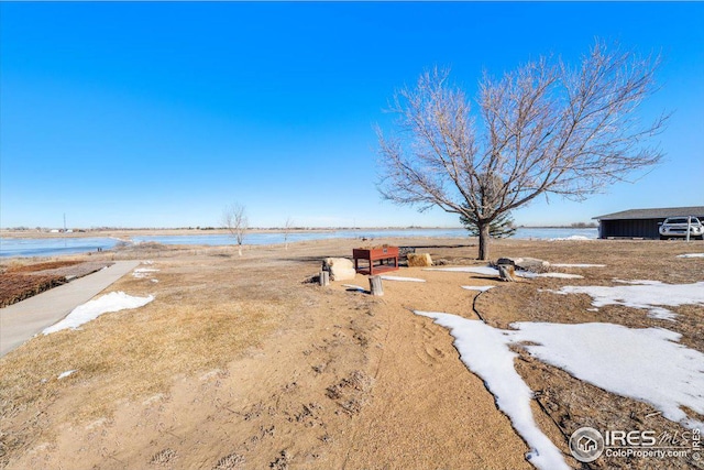 view of yard with a water view