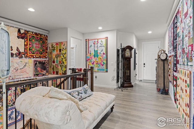 bedroom with light hardwood / wood-style floors