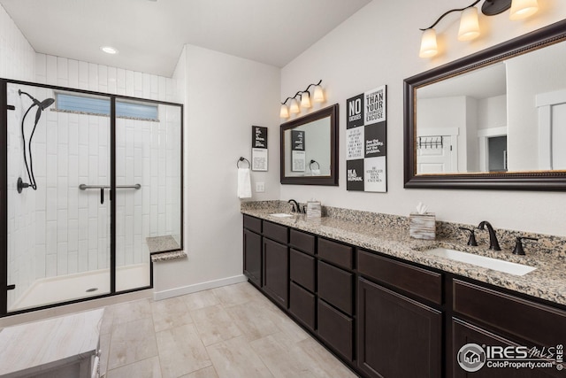 bathroom with vanity and an enclosed shower