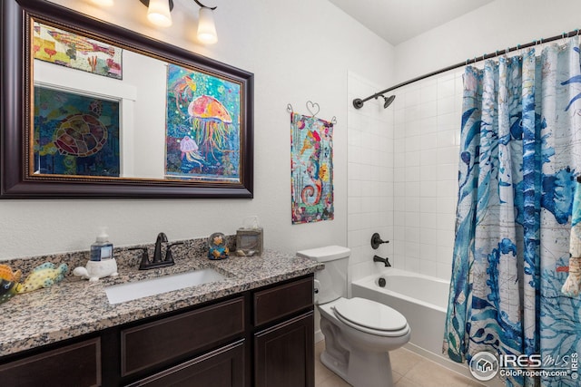 full bathroom featuring shower / tub combo with curtain, vanity, toilet, and tile patterned flooring