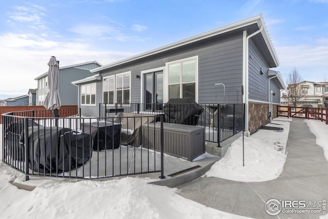 view of snow covered property