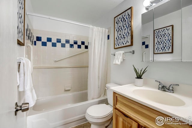 full bathroom featuring vanity, shower / tub combo, and toilet