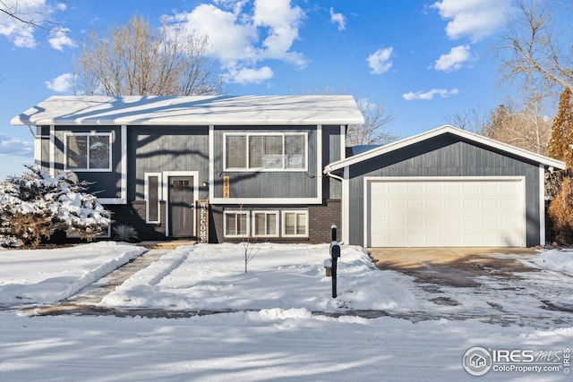 bi-level home featuring a garage