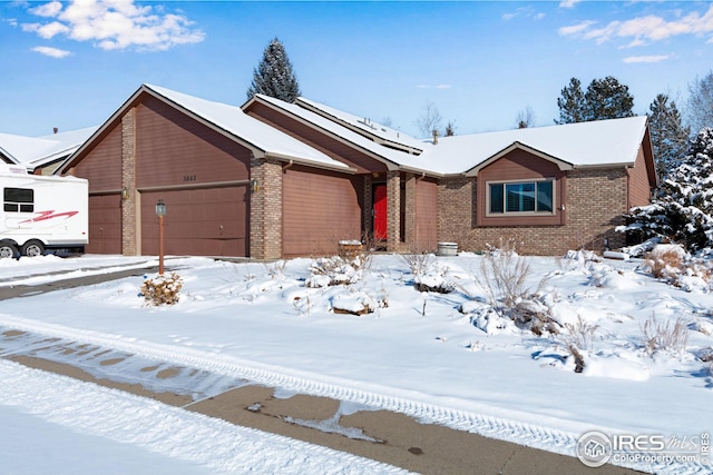 single story home featuring a garage