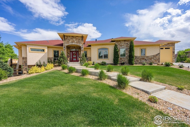 mediterranean / spanish-style home featuring a front yard