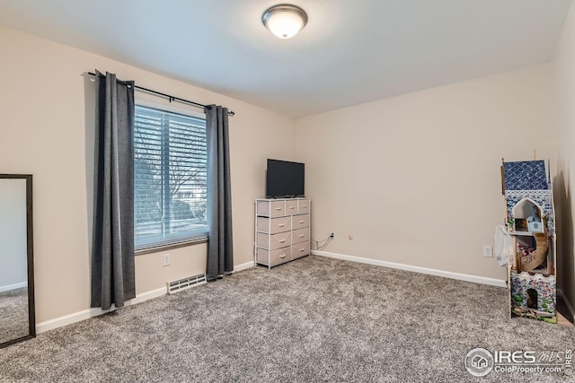 unfurnished bedroom featuring carpet