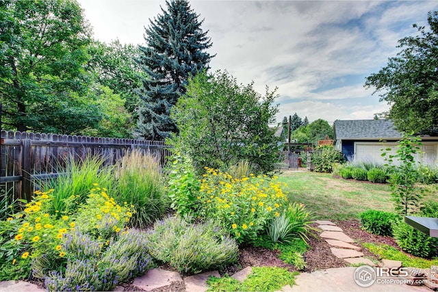 view of yard featuring a garage