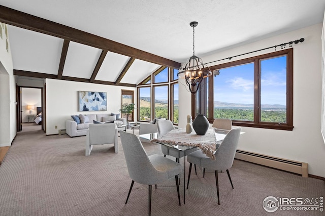 dining room featuring baseboard heating, light carpet, vaulted ceiling with beams, an inviting chandelier, and a mountain view