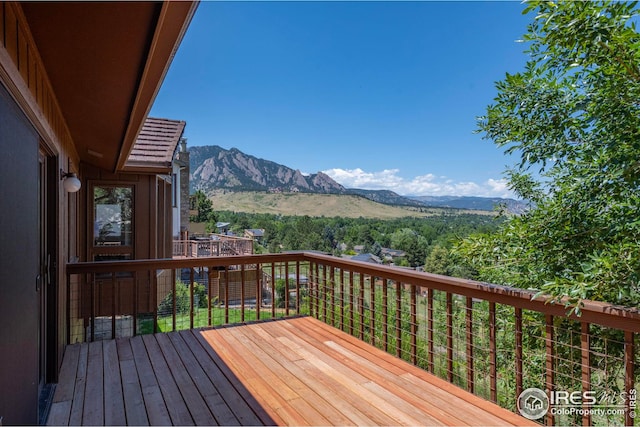 wooden terrace with a mountain view