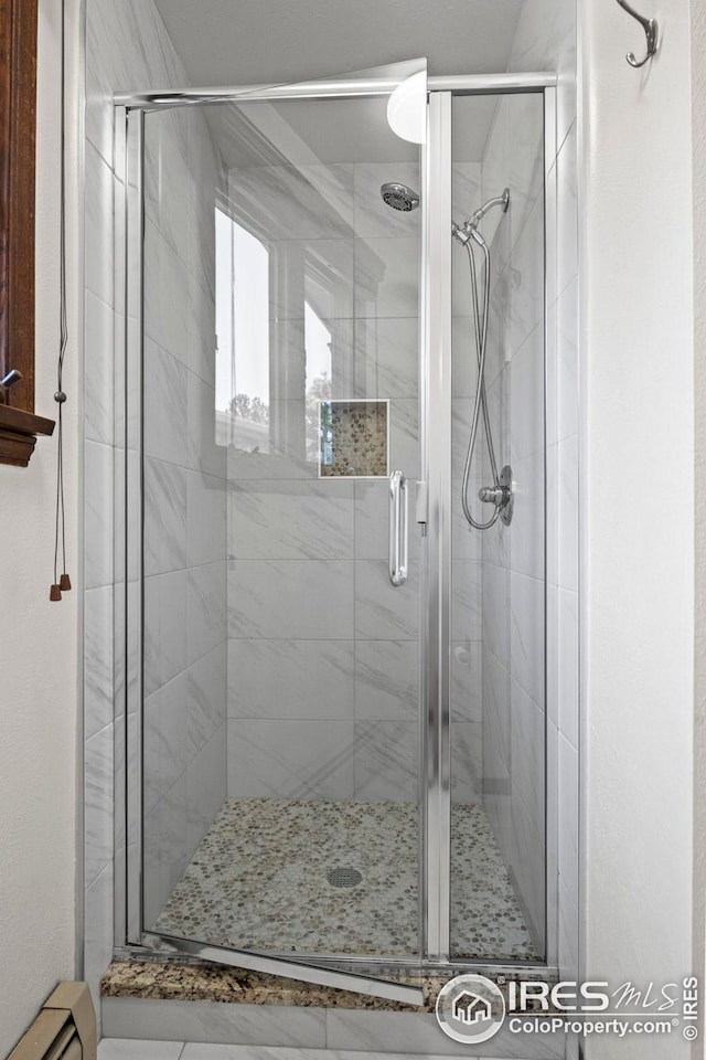 bathroom featuring walk in shower