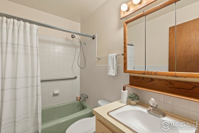 full bathroom with toilet, vanity, shower / tub combo, and tasteful backsplash