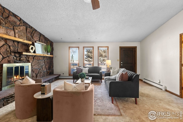 living room featuring baseboard heating, a textured ceiling, light carpet, and a fireplace