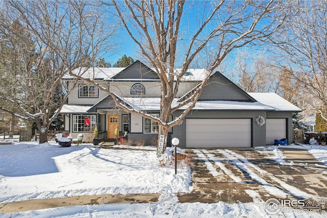 front of property with a garage