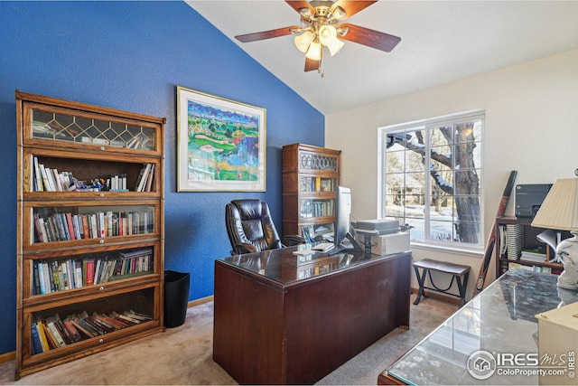 office space with light carpet, vaulted ceiling, and ceiling fan