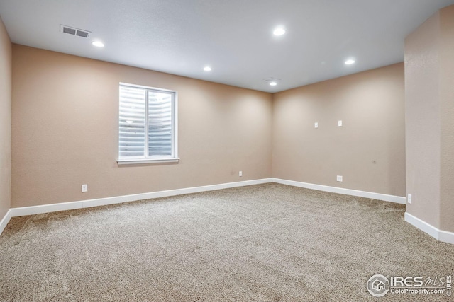 view of carpeted spare room