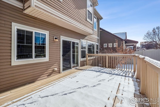 view of snow covered deck