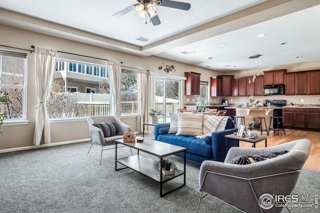 living room featuring ceiling fan