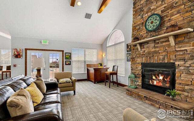 living room with light carpet, a fireplace, lofted ceiling with beams, and french doors