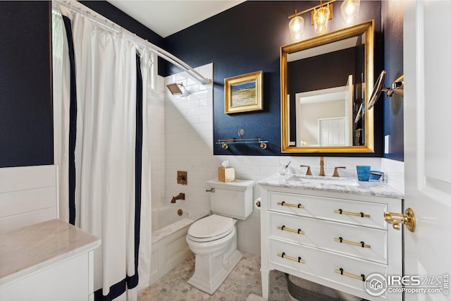 full bathroom with tile walls, shower / tub combo, vanity, tile patterned floors, and toilet